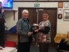 Heather George receiving the Mary Tarrant Memorial Trophy for the person contributing most to the club