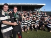 100-0301Magpie magic: Temuka senior B side celebrate their 28-13  Glover Cup win over Harlequins. Captain for the day Quentin Wood and injured skipper Shane Wolczuk with the silverware.