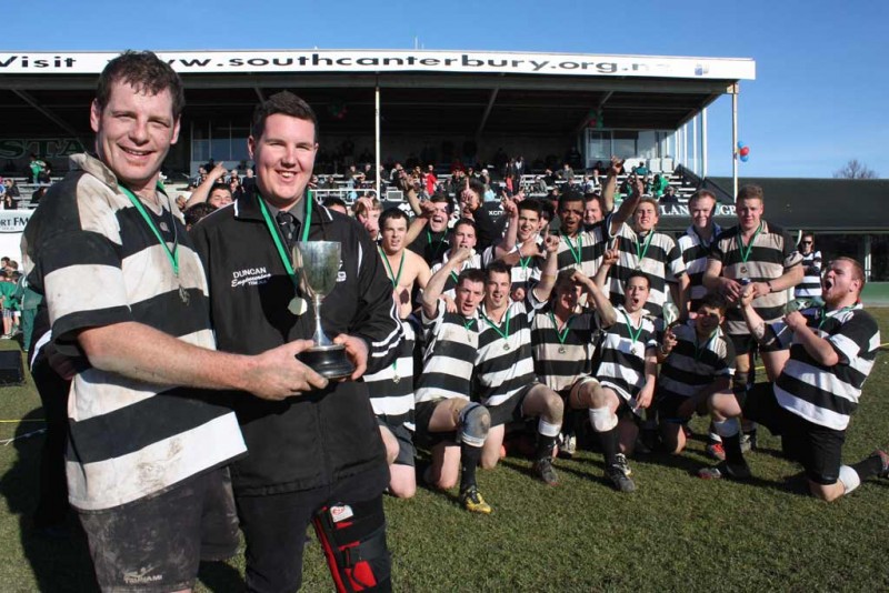 Champion side: Temuka senior B side celebrate their 28-13 Glover Cup win over Harlequins. 100-0301Magpie magic: Temuka senior B side celebrate their 28-13 Glover Cup win over Harlequins. Captain for the day Quentin Wood and injured skipper Shane Wolczuk with the silverware.