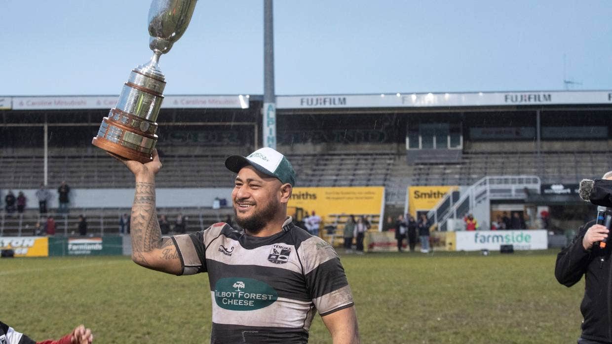 An elated Temuka captain Junior Faavae holds the Hamersley Cup aloft after victory over Harlequins.An elated Temuka captain Junior Faavae holds the Hamersley Cup aloft after victory over Harlequins.